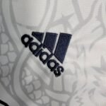 Kids Real Madrid 2022/23 White Dragon Edition Kit 9