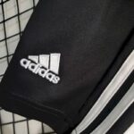 Kids Real Madrid 2022/23 Black Dragon Edition Kit 7