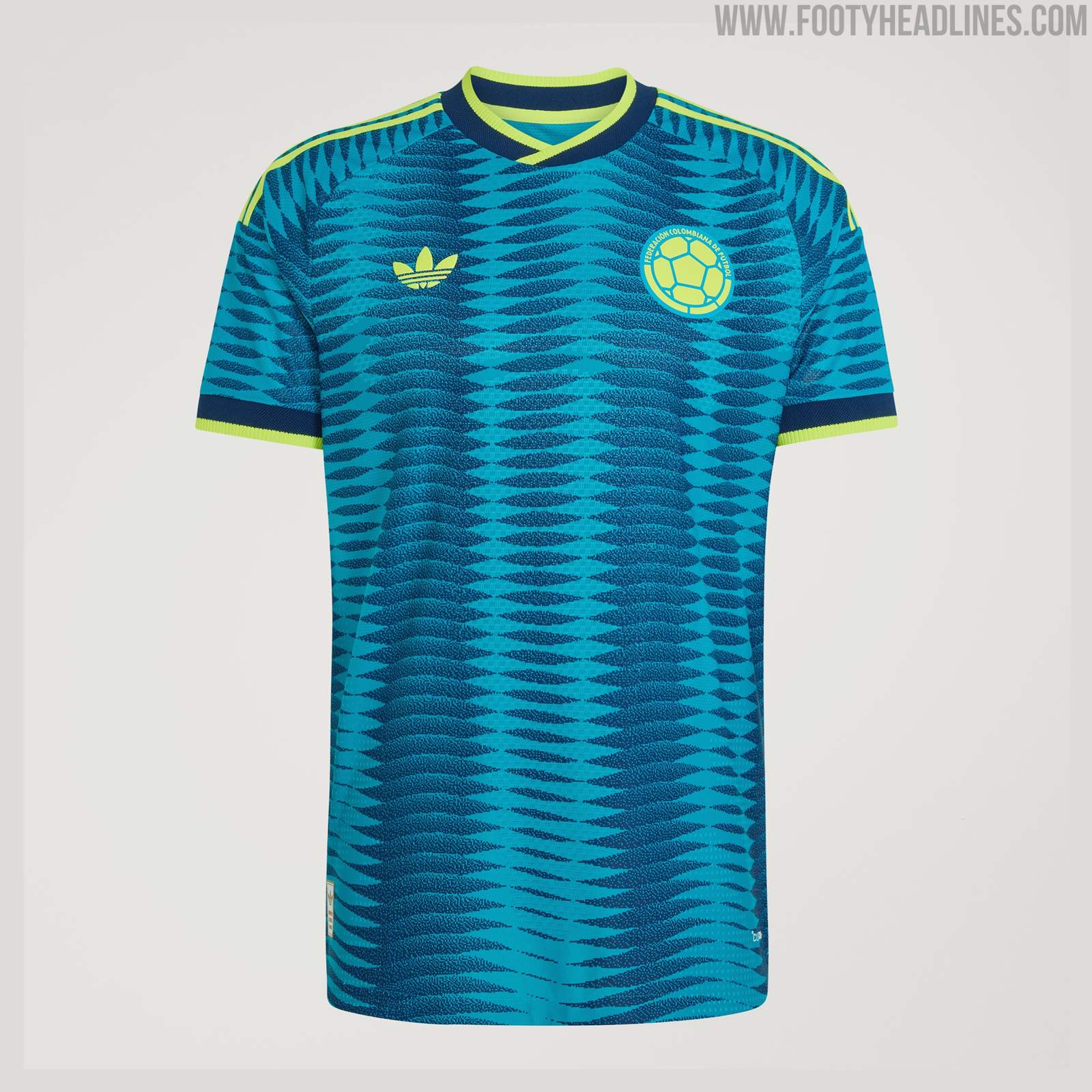 Colombia 2026 World Cup away kit revealed image in navy and petrol blue with an ocean-inspired wave pattern and neon-yellow trim