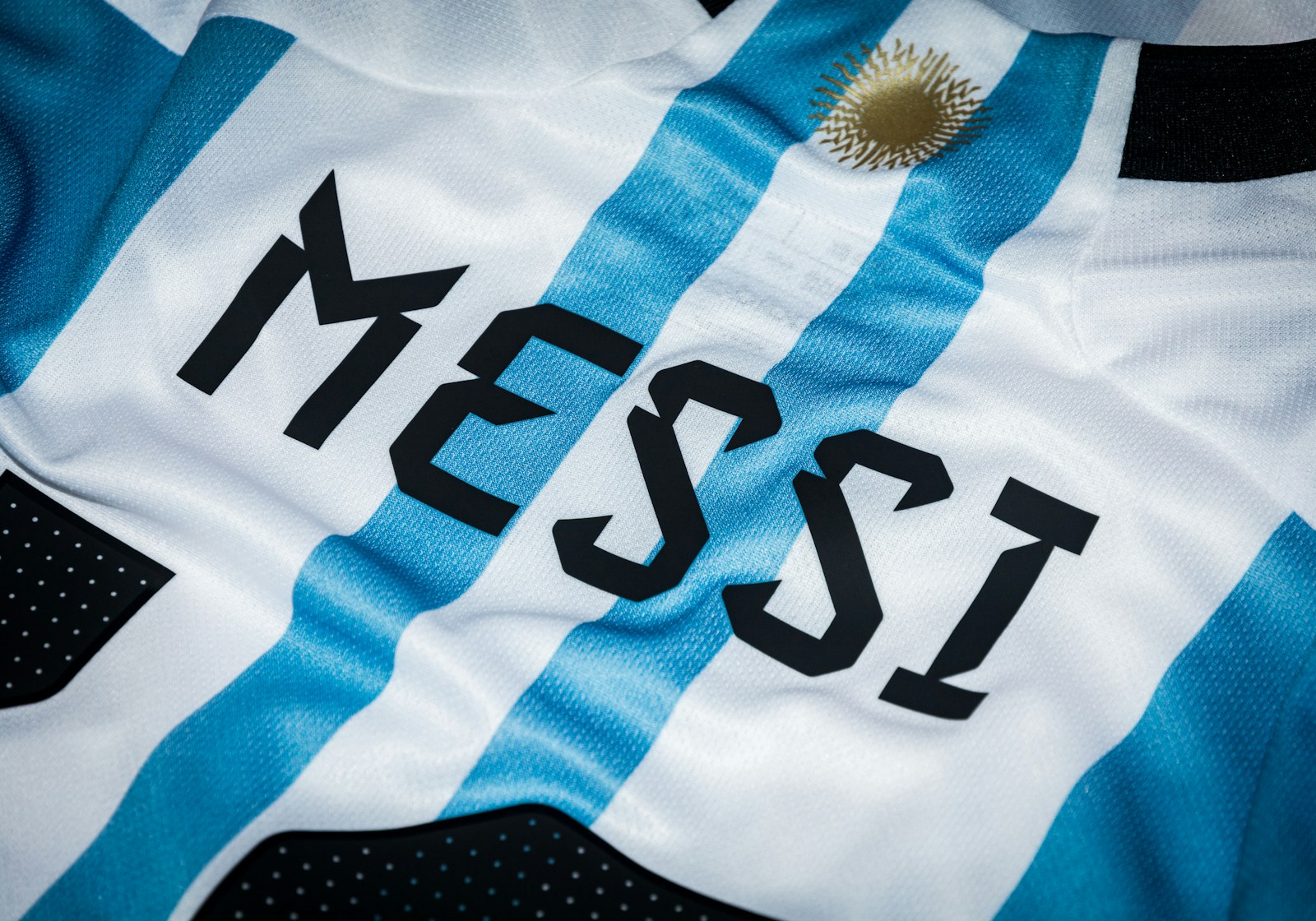 Close-up of football shirt back showing printed name and number 22