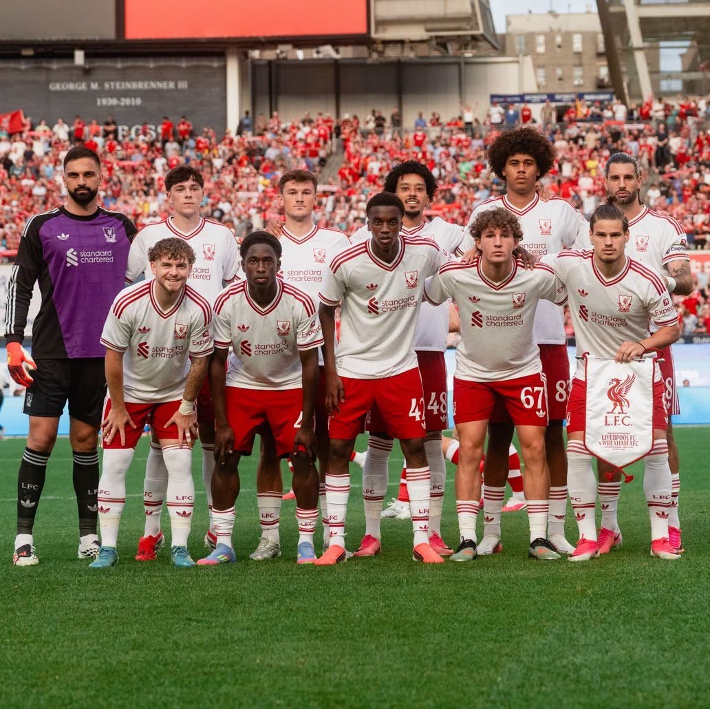 Liverpool's white 2026-27 Adidas away shirt with maroon-red Trefoil branding, worn against Wrexham