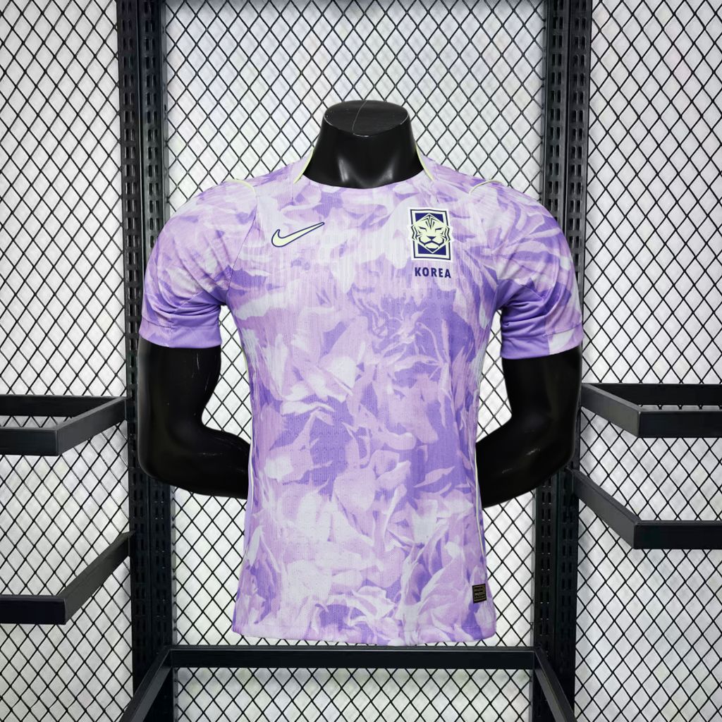 Player version football shirt close-up showing technical fabric and slim athletic fit